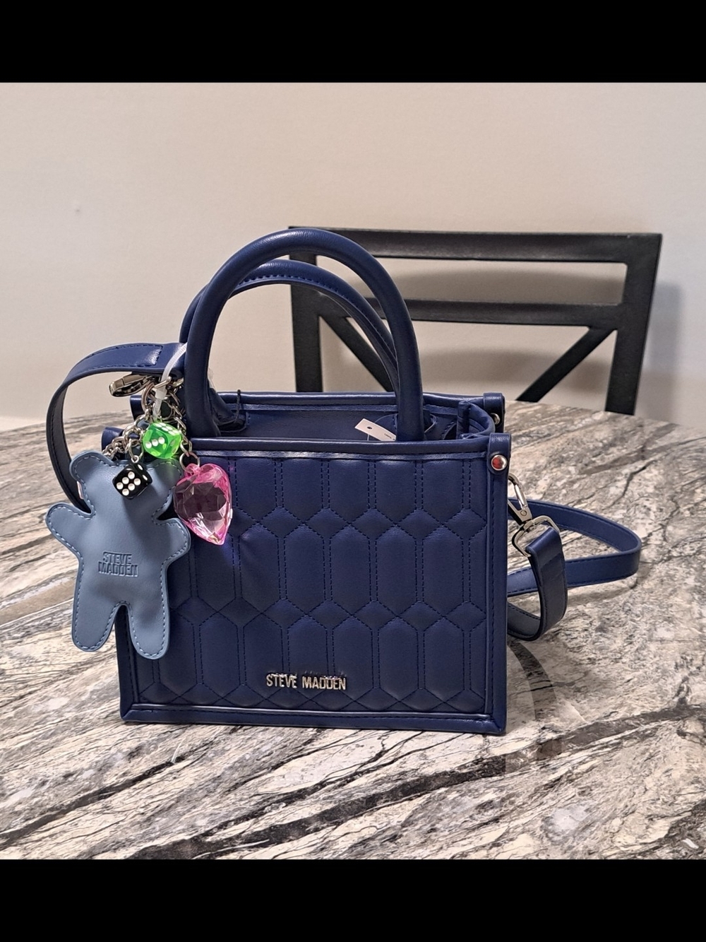 Steve Madden Navy Binko Quilted Satchel with Bag Charms & Cross.\nBody Strap - Picture 6 of 6